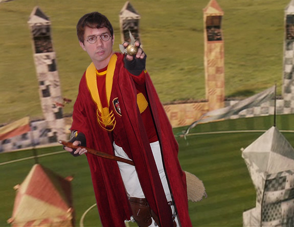 Jeff Brock as Harry Potter, flying in a Quidditch match.