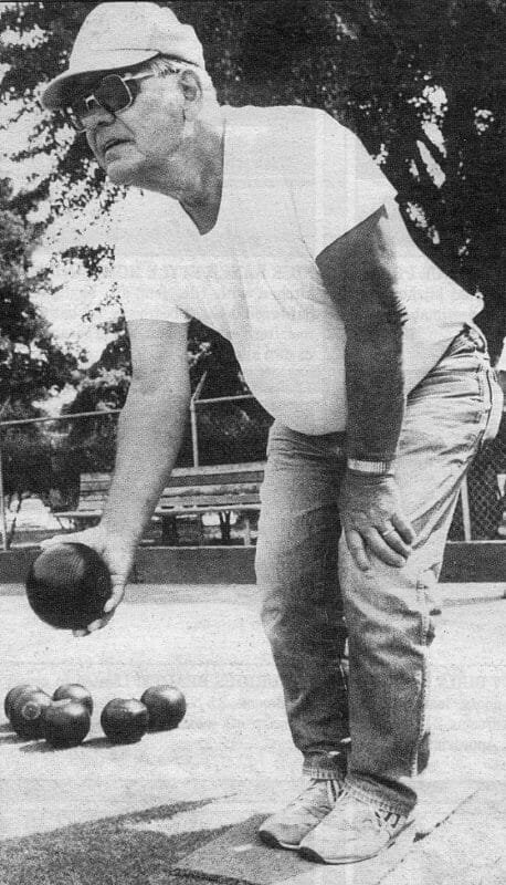 Ted Forster pitches the flattened spheroid that is the focus of action at the Bramhall Willow Street Park Lawn Bowling Green.